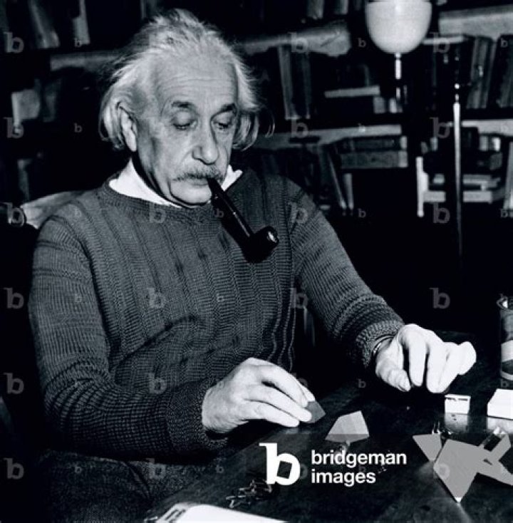 Albert Einstein Smoking A Pipe