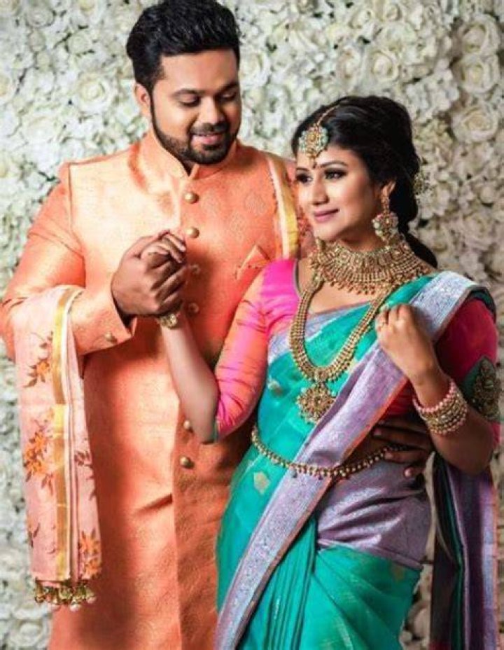 Alya Manasa and her husband Sanjeev Karthick with their brand new Mercedes