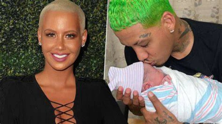 Amber Rose Holding Her Newborn Baby