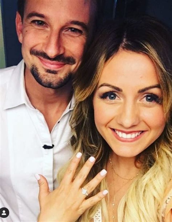 Carly Waddell showing her engagement ring