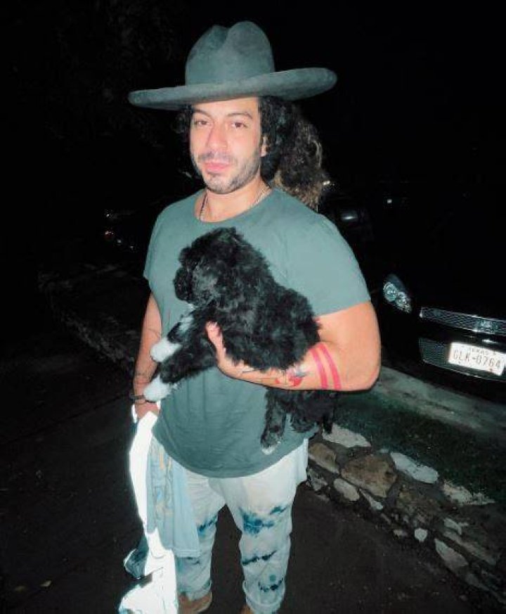 Daniel Sahad with his pet dog