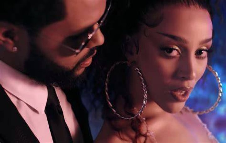 Doja Cat & The Weeknd Get Flirty In The 