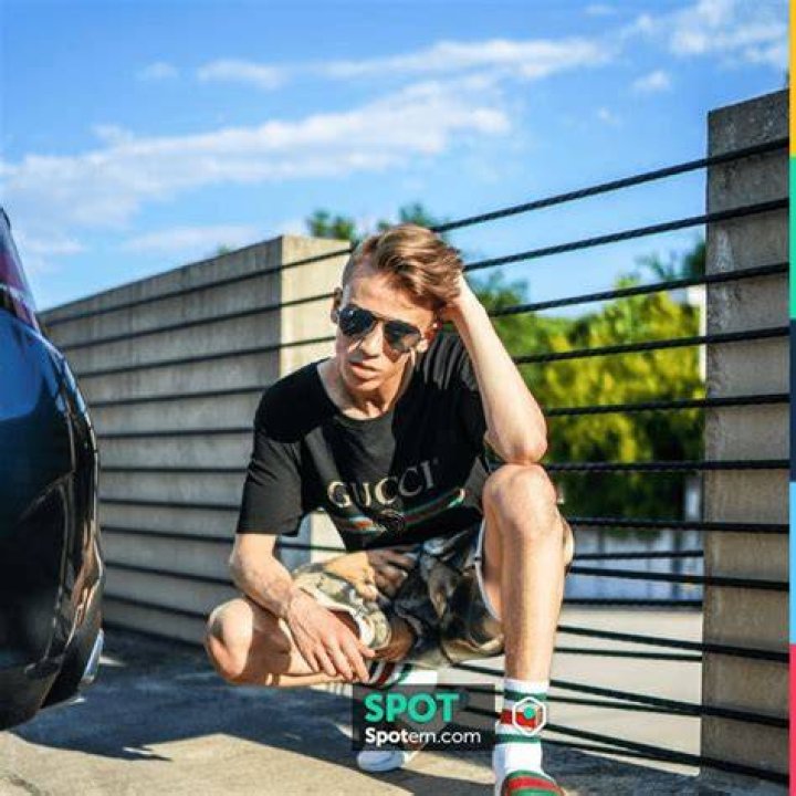 Giancarlo Purch wearing Gucci