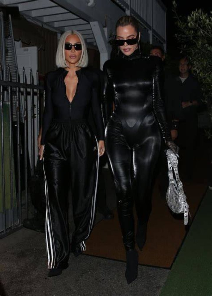 Kim and Khloe Kardashian Match in Black Bikinis in Ocean Photos