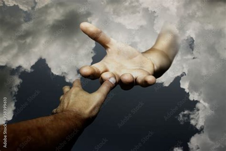 Man Holding In God We Trust Banner