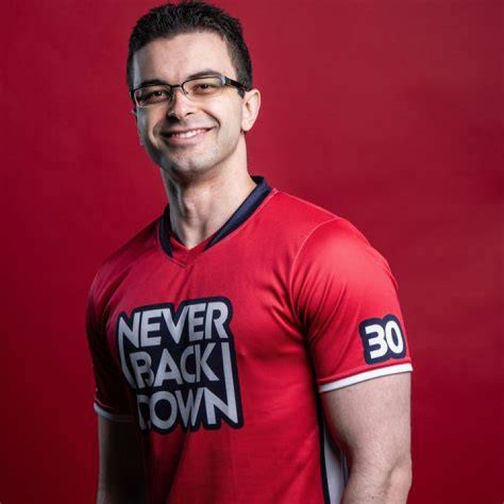 Nick Eh 30 with his brother and mother