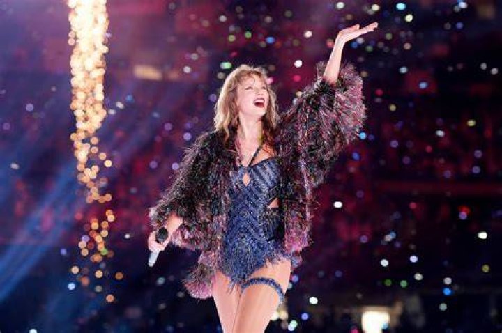 Taylor Swift performing the first night of her Eras tour in Argentina. Travis Kelce skipped the concert in favor of attending Patrick Mahomes' charity gala.