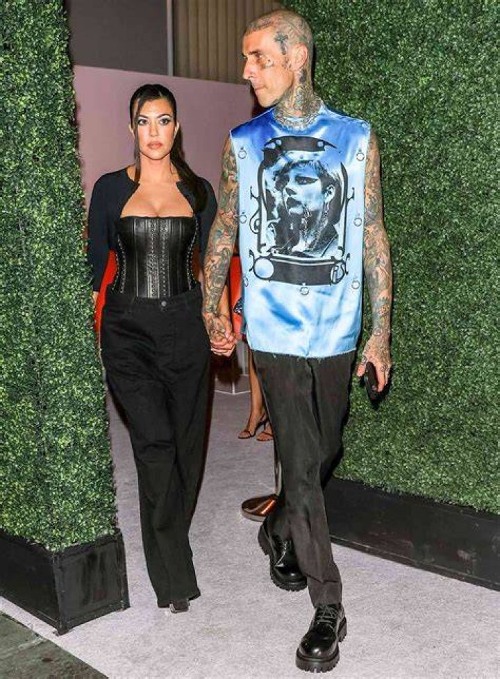 Travis Barker and Kourtney Kardashian Hold Hands in Bed