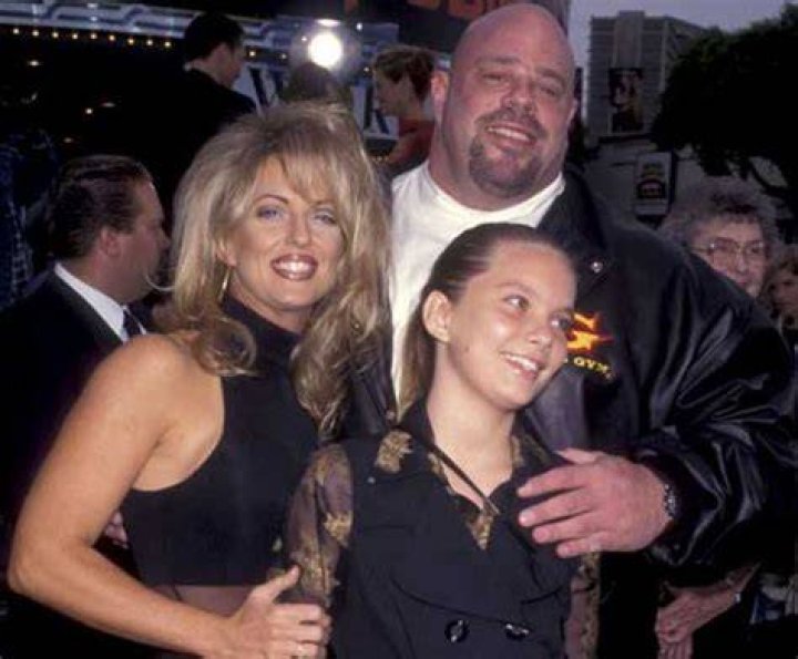 Young Kayleigh Swenson with her parents